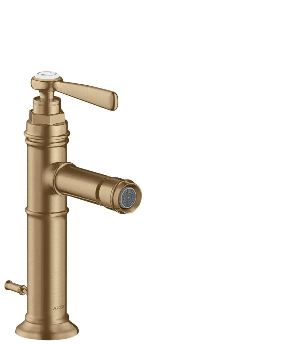 AXOR Bidetmischer in gebürstetem Bronze mit seitlichem Hebelgriff und integrierter Zugstangen-Ablaufgarnitur.